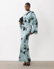 long sleeve tucked waist bias maxi dress in blue blurred floral print