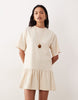 drop waist mini dress in beige