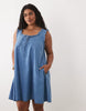 Curve denim ruffle detail mini dress with pockets in mid blue