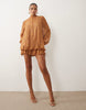 lace mini dress with blouson sleeve and hem detail in tan