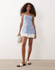 cotton linen bandeau mini sundress with ruffle hem in blue and pink stripe