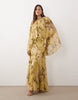 full volume cape sleeve maxi dress with godets in green floral print