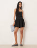 crinkle mini sundress with shirred dropped waist in black