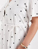 ONLY Curve tie waist mini dress in white polka dots