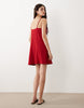 textured strappy mini dress with tie detail front in red