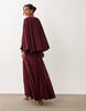 full volume cape maxi dress with godets in berry