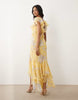 frill sleeve maxi dress with fishtail hem in yellow floral print