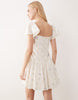 Kiss The Sky Bella flutter sleeve floral mini dress in white