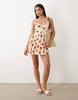 button crinkle mini dress in yellow & red floral print