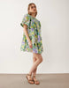 crew neck shirred smock mini dress in green floral print