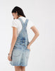 Tommy Jeans denim overalls dress in light wash blue