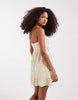 Hollister strapless tie up ruffle babydoll mini dress in yellow polka dots