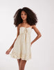 Hollister strapless tie up ruffle babydoll mini dress in yellow polka dots