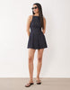 denim racer neck mini dress with godet hem in rinse