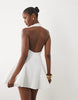 plunge neck structured full skirted mini dress in ivory scuba-style fabric