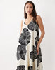 sleeveless v-neck trapeze maxi dress in black and cream leaf print