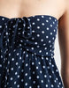 Hollister strapless tie front ruffle trim babydoll mini dress in navy polka dots