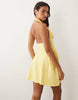 halter mini dress with gathered sides in buttermilk