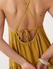 textured halter trapeze maxi dress in ocre