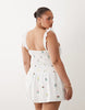 Esmée Curve mini beach dress in white delicate floral