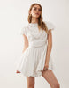 bubble mini dress with cutwork embroidery in white