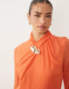 Daska ruched long sleeve maxi dress with gold-tone buckle detail in orange