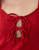 textured strappy mini dress with tie detail front in red