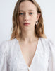 & Other Stories embroidered mini dress with front tie detail and tiered hem in white
