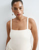 ARRANGE Curve premium waisted dress with puffball hem in ecru