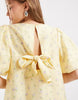 PIECES volume sleeve bow back mini shift dress in yellow ditsy floral print