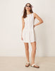 slash neck button down dropped waist mini dress in white