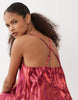 VILA cami maxi dress with crossed straps in red tropical print