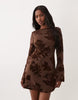 flocked floral mini dress with fluted sleeves in ginger