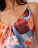 bias cut scoop neck low back satin mini dress in bright abstract print
