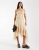 Reclaimed Vintage maxi dress with ruffle details and asymmetric hem in cream