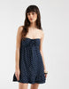 Hollister strapless tie front ruffle trim babydoll mini dress in navy polka dots