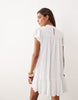Noughts & Kisses crochet insert flutter sleeve dropped hem mini dress in white