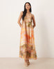halterneck maxi dress with bead detail in washed sunset print