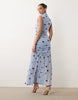 printed polka dot ruched drop waist circle dress with grown-on neck in blue