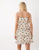 JDY mini cami dress with ruffle layers in cream polka dot print