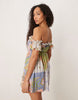 eyelet frill off the shoulder mini dress in patchwork floral print