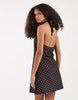 Vero Moda halter neck polka dot mini dress in brown and yellow polka dot print