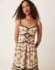 cami cut out embroidered maxi dress in stone with black tipping