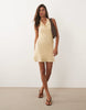 Mango halterneck mini dress in yellow polka-dot print
