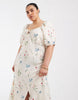 Vero Moda Curve puff sleeve tie front detail maxi dress in cream floral print