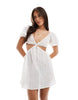 Esmee Exclusive eyelet cut out puff sleeve mini beach dress in cream