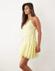halterneck mini dress with lace trim details in soft yellow