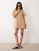 relaxed short sleeve poplin mini dress in tan