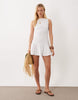 shirred dropped waist mini dress in white
