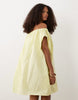 volume puff mini dress in lime plaid print